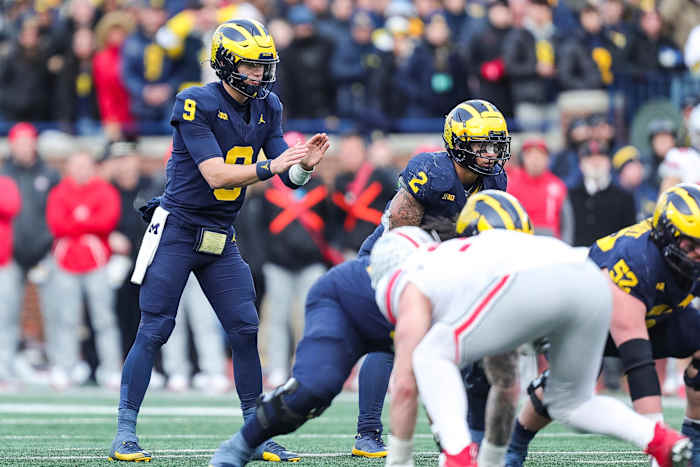 Michigan Wolverines quarterback J.J. McCarthy prepares for a snap against the Ohio State Buckeyes.